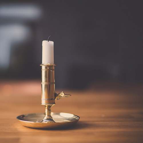 candle holder silver candlestick with white candle gold
